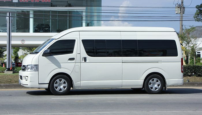 A Toyota vehicle commonly used as a minibus/van in Thailand